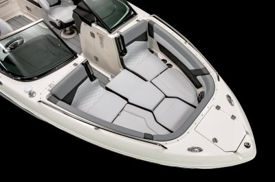 Chaparral 26 SURF bow filler cushion converts seating area into large sunpad. 