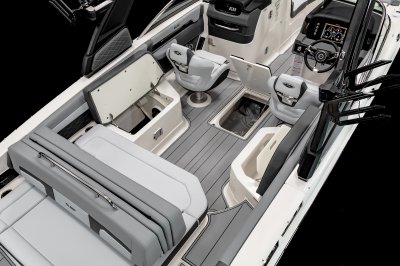 Chaparral 26 SURF in-floor storage with ballast bag and storage under each side bench seat. 