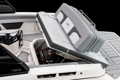 Chaparral 26 SURF lid under aft bench folds up to give wide engine bay access. 