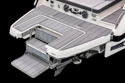 Chaparral 26 SURF Infinity Power Step folds out from the swim platform providing steps into the water. 