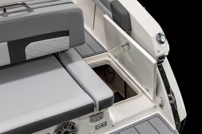 Chaparral 26 SURF storage compartment built into the starboard walkway deck. 