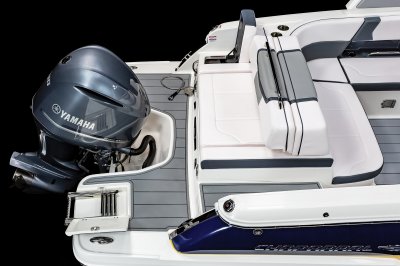 Chaparral 270 OSX swim platform has utility access and a retractable sprayer hose. 