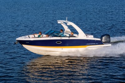 Chaparral 270 OSX cruising in the ocean with 4 passengers. 